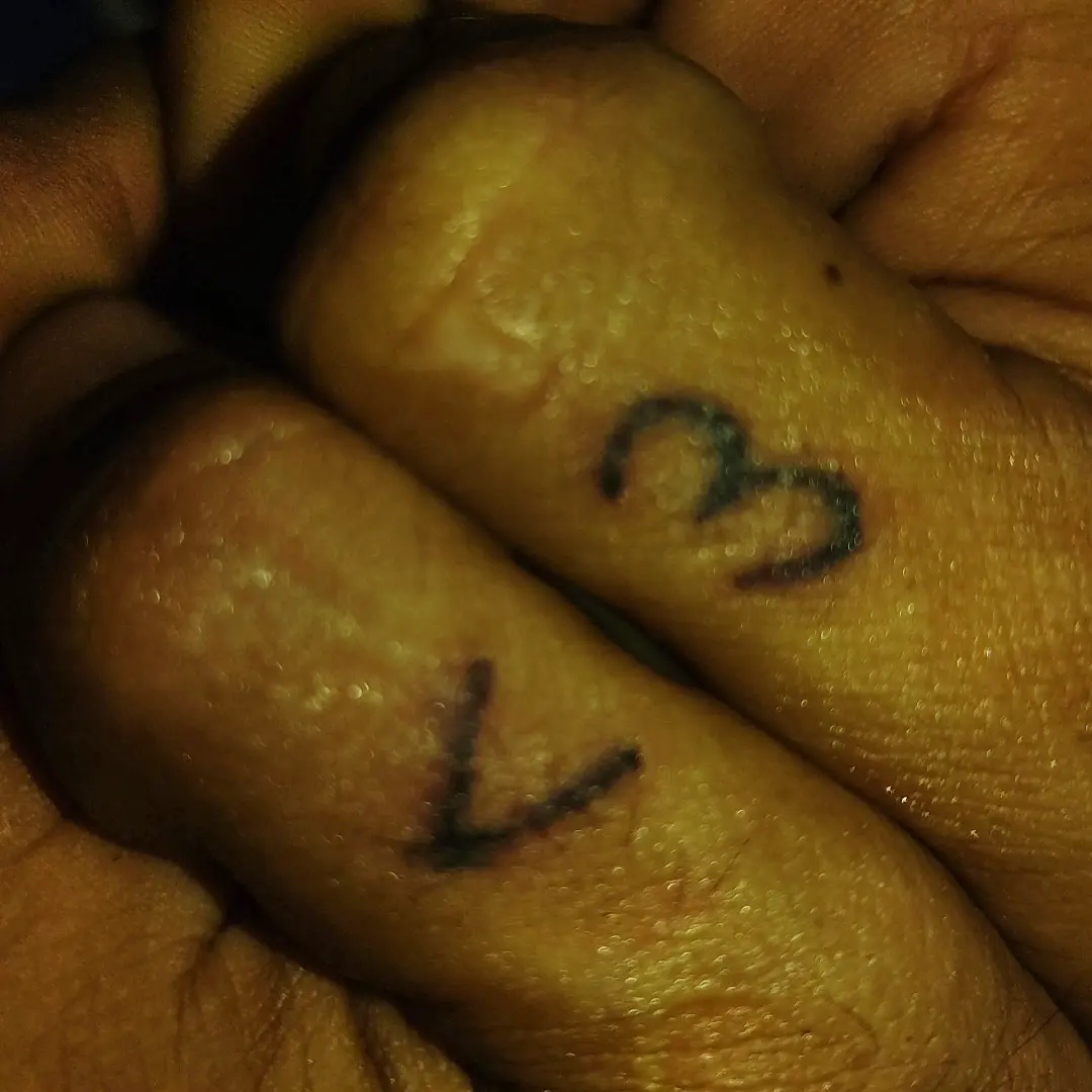 Number tattoo lettering script tattoo on the hand by Tatuadora & Piercer