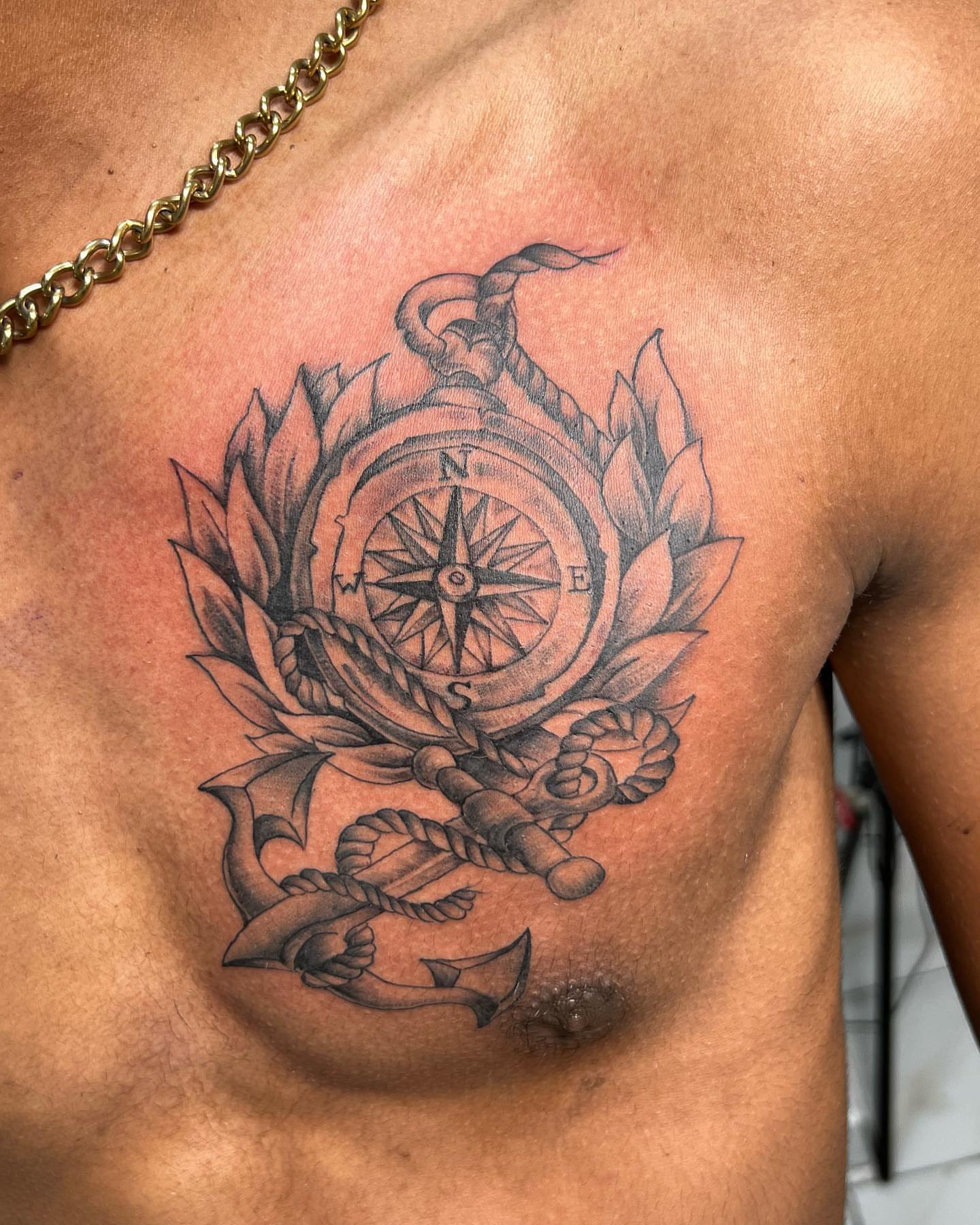Compass and anchor black and grey tattoo on the chest by oxideTattoo, Morne-à-l'Eau