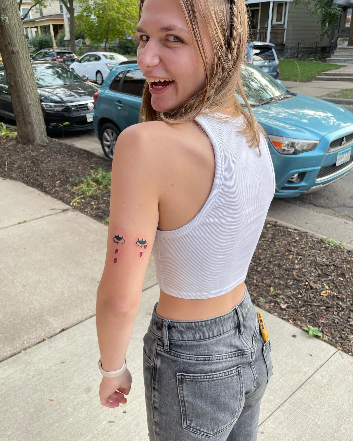 Cat and heart dotwork tattoo on the forearm by Anna sabrowsky