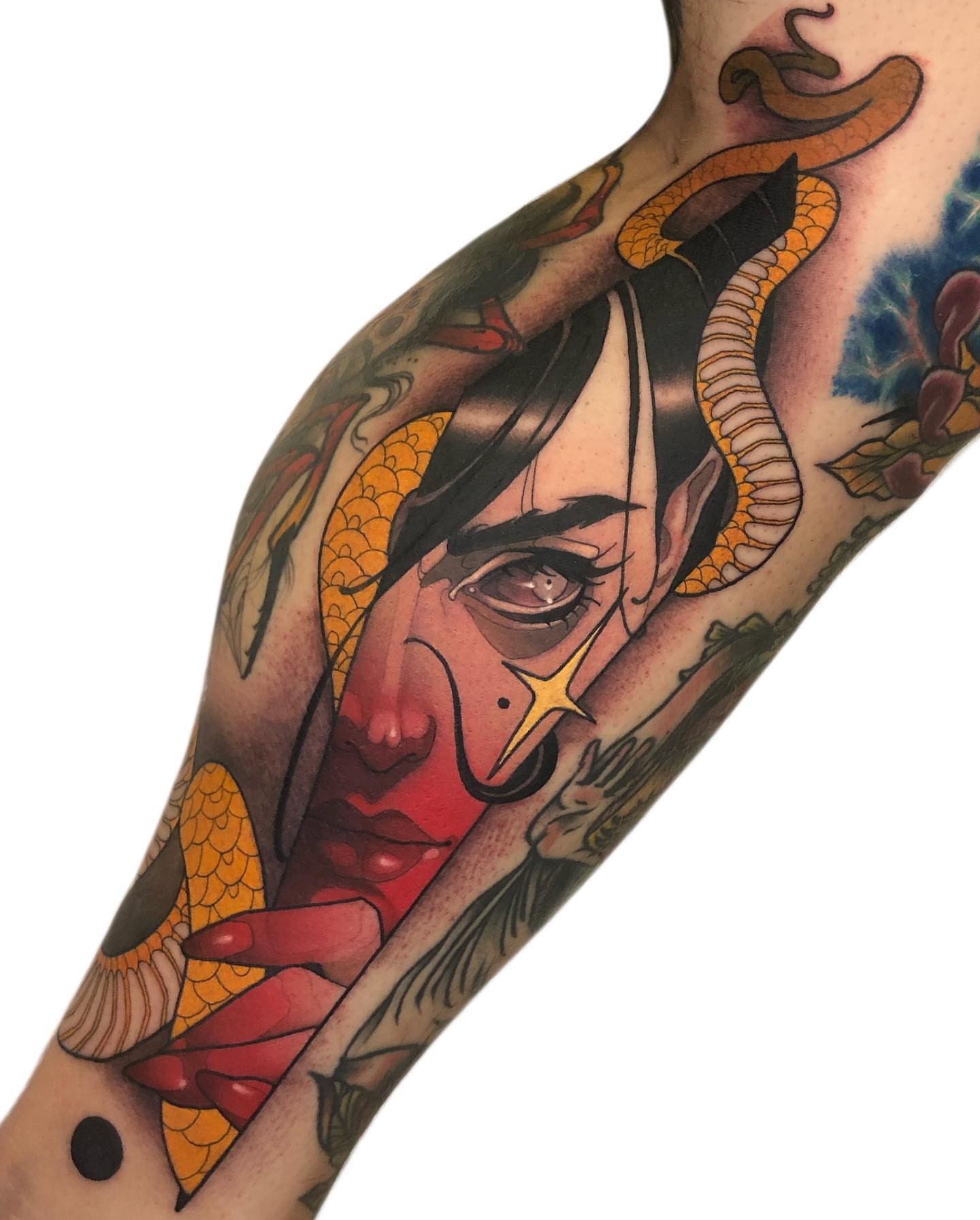 Woman's face American traditional tattoo on the forearm by Levi Murphy