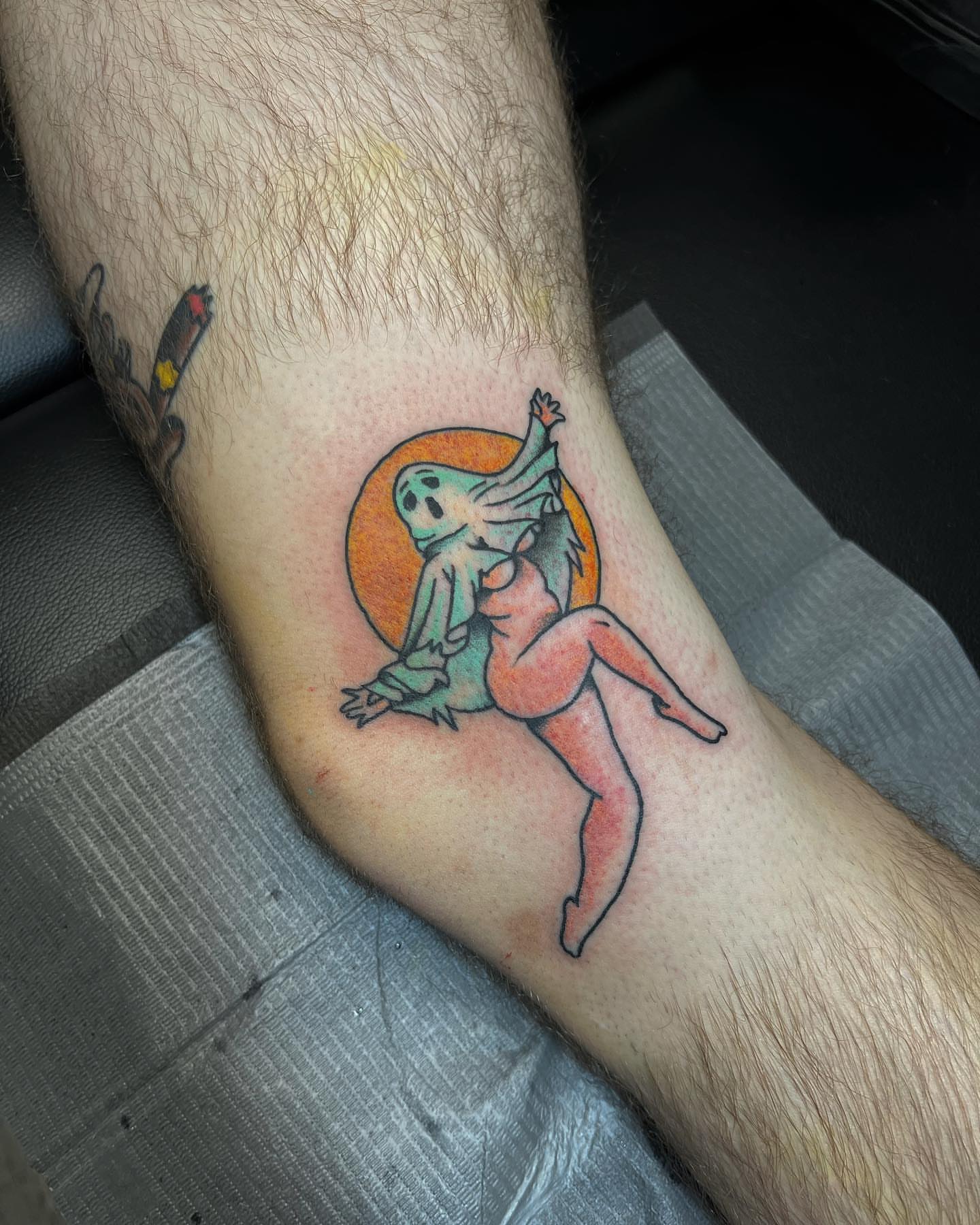 Skull and woman dotwork tattoo on the forearm by duffs, San Marcos, California