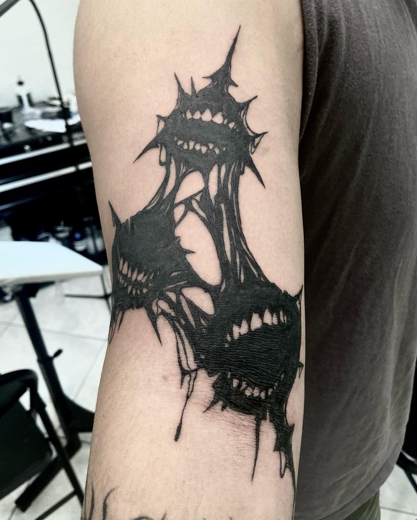 Spiky tree dark realism tattoo on the forearm by Nathan