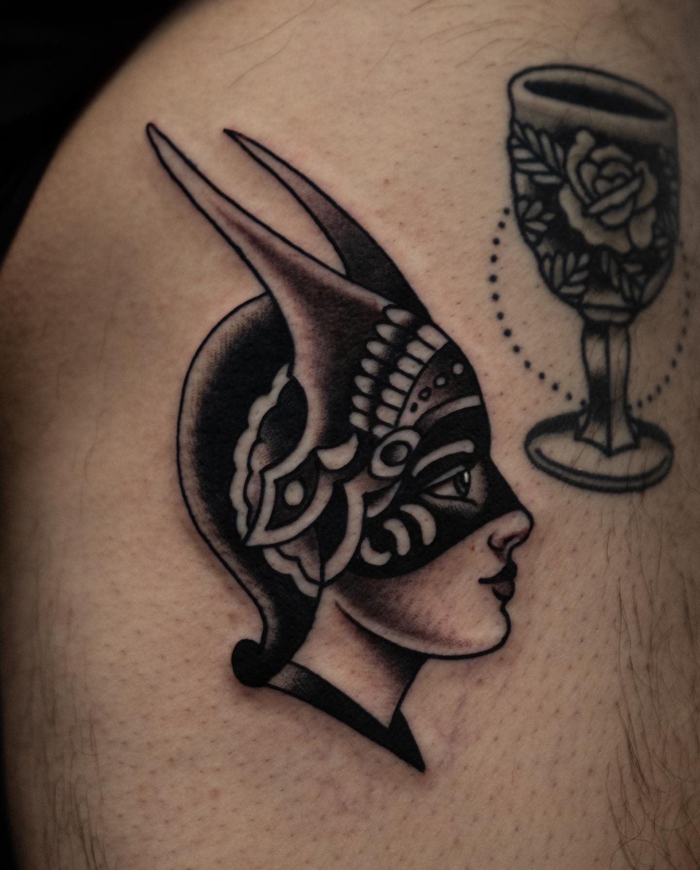 Woman with rabbit ears American traditional tattoo on the shoulder by Danny Derrick, San Luis Obispo, California