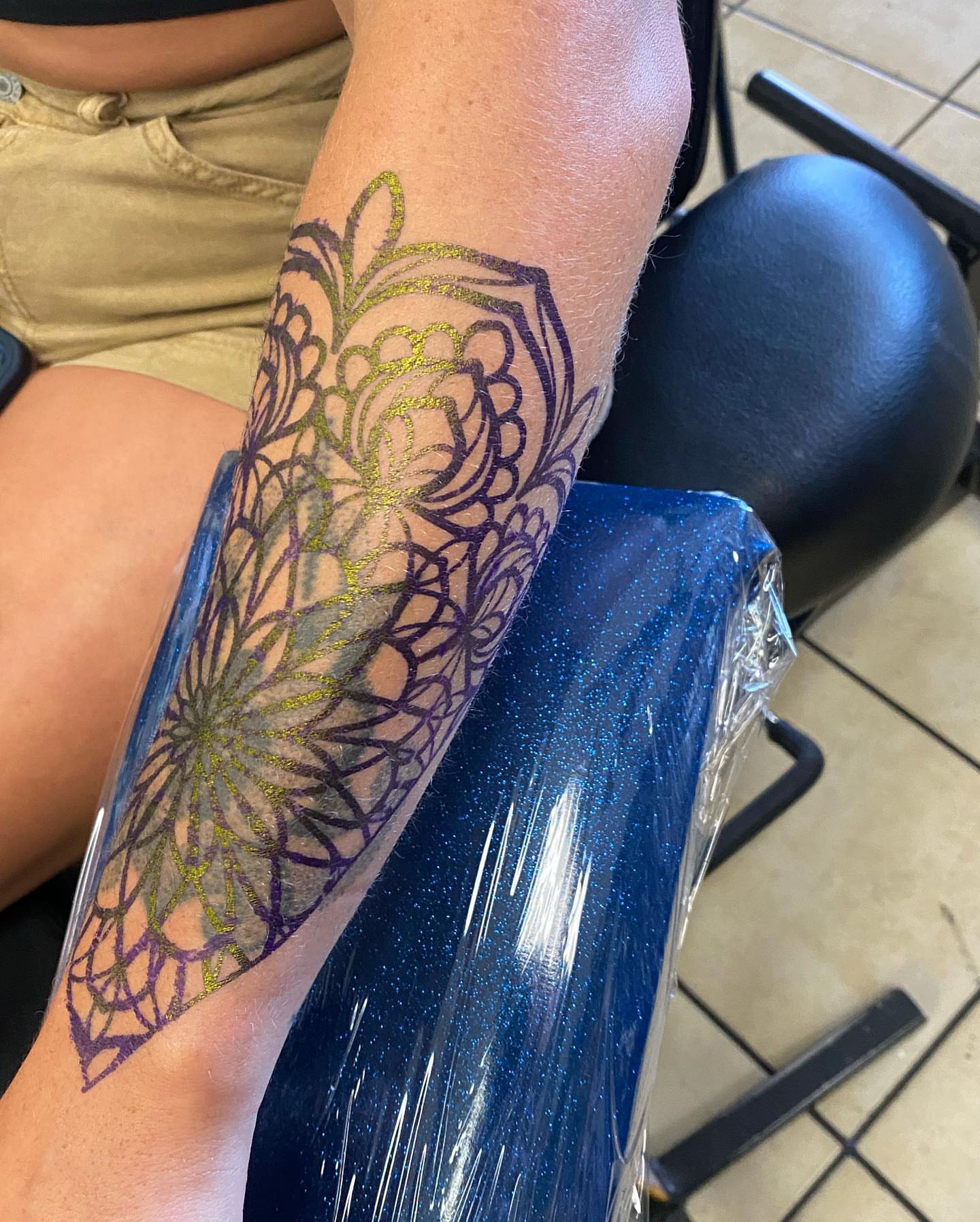 Mandala geometric tattoo on the forearm by Nicholas Jones