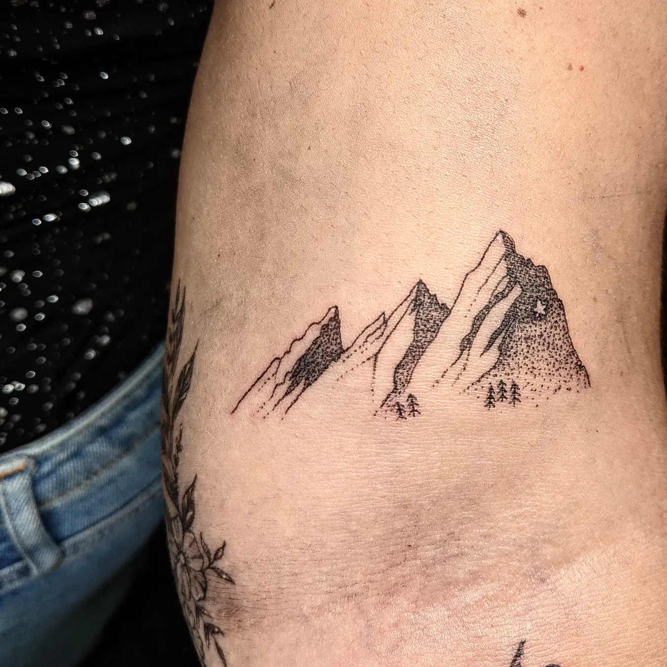 Mountain range dotwork tattoo on the thigh by Aim 🤍