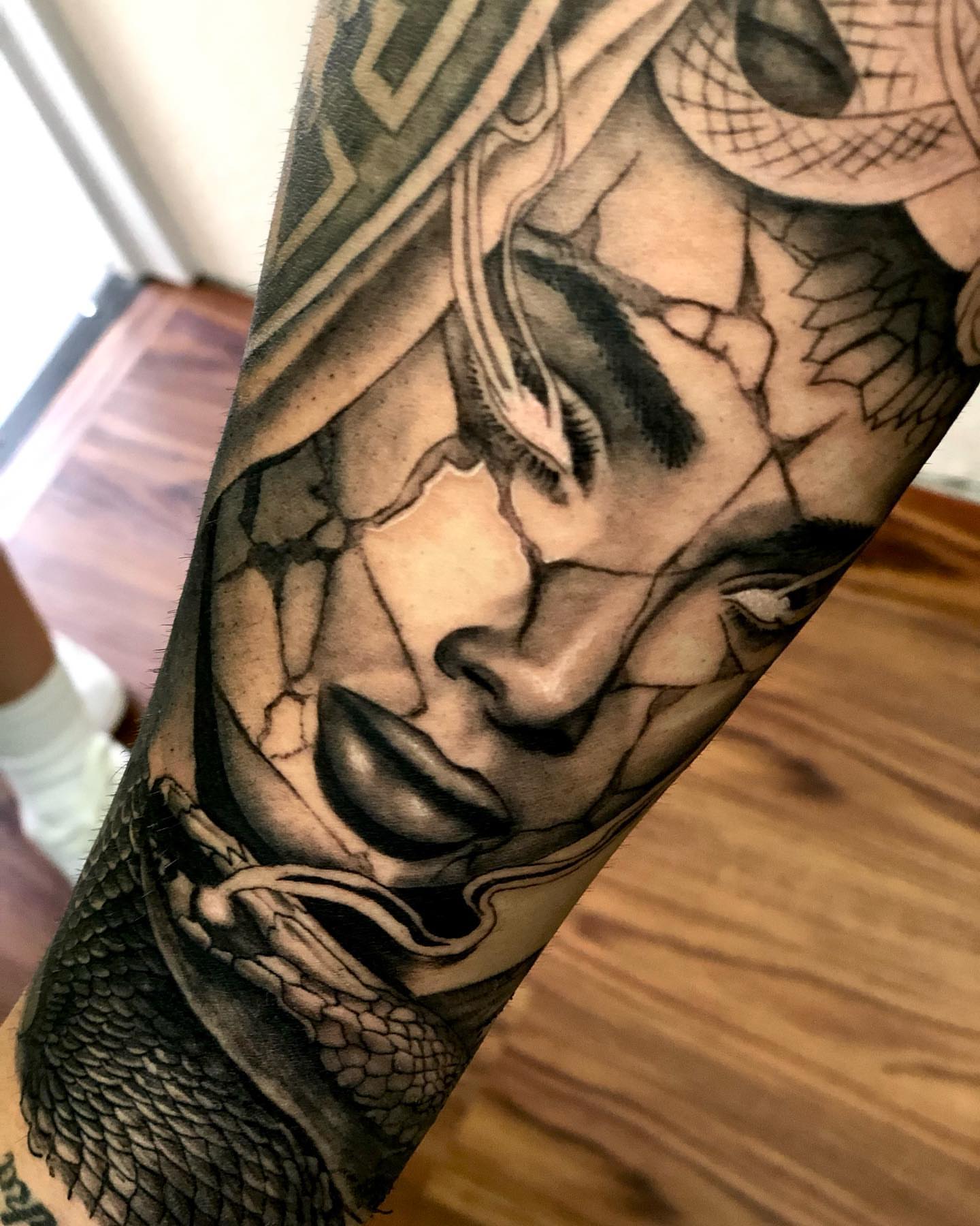 Tattoo by @ink_kevin_ — realism, black_and_grey