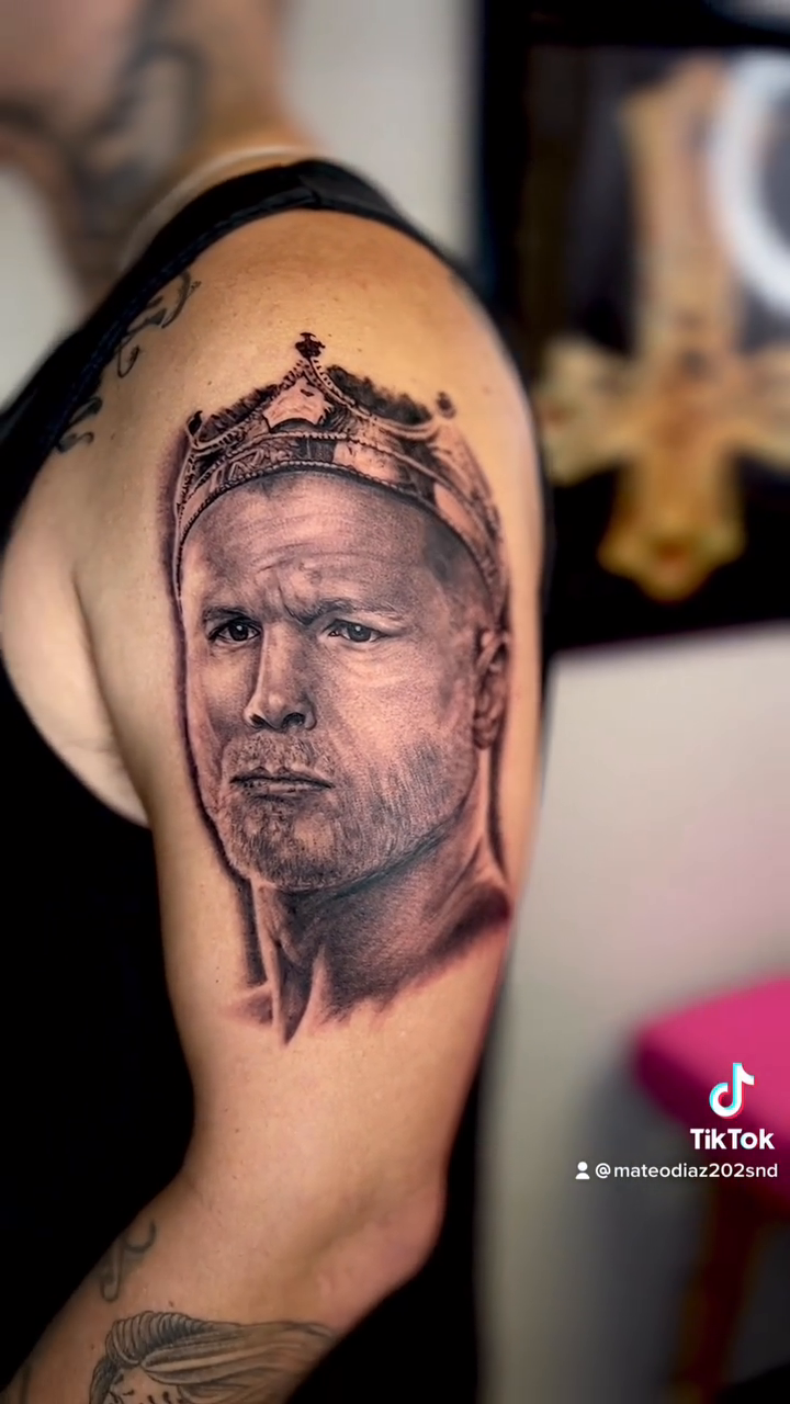 Man and crown realism tattoo by Matthew Diaz