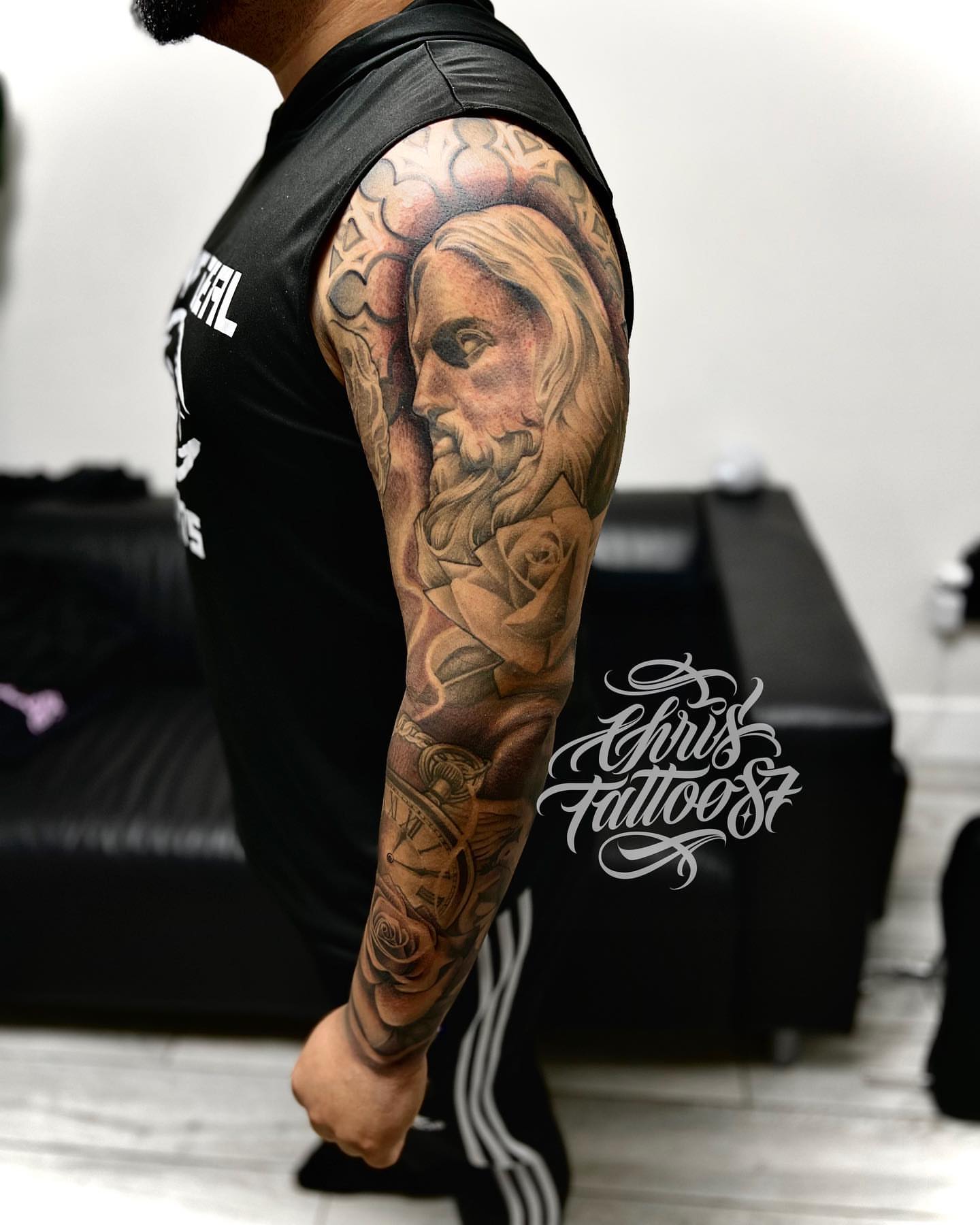 Tattoo by @chris_tattoo87 β realism, black_and_grey