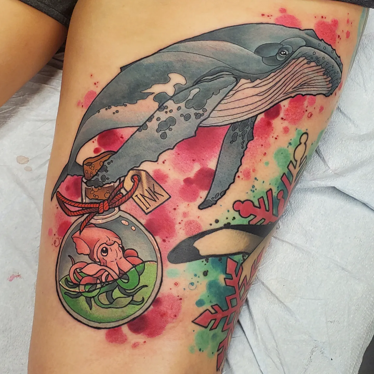 Whale and octopus watercolor tattoo on the thigh by Brian Savage, Gilbert, Arizona