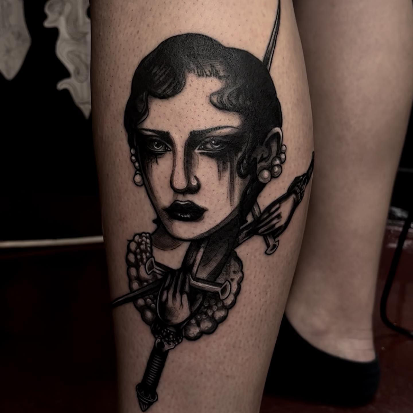 Woman with dagger realism tattoo on the thigh by Myla Jane, Houston, Texas