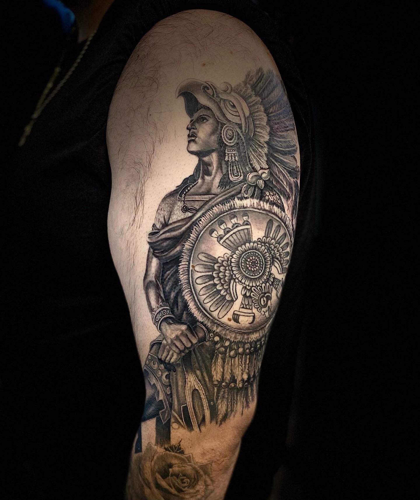 Indian warrior realism tattoo on the forearm by Eduardo Gomez