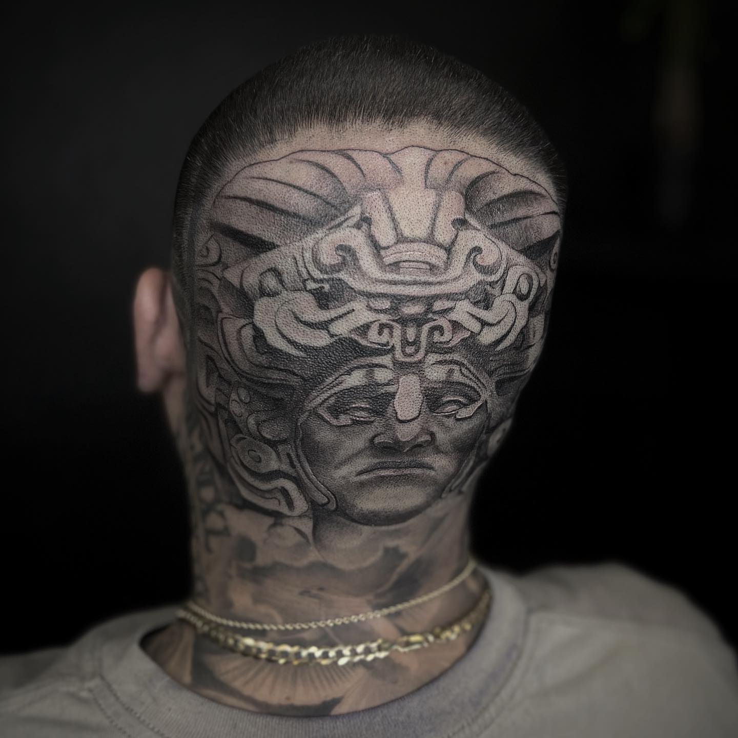 Ancient mask geometric tattoo on the head by 𝐓𝐚𝐭𝐭𝐨𝐨 👩🏻‍🎨