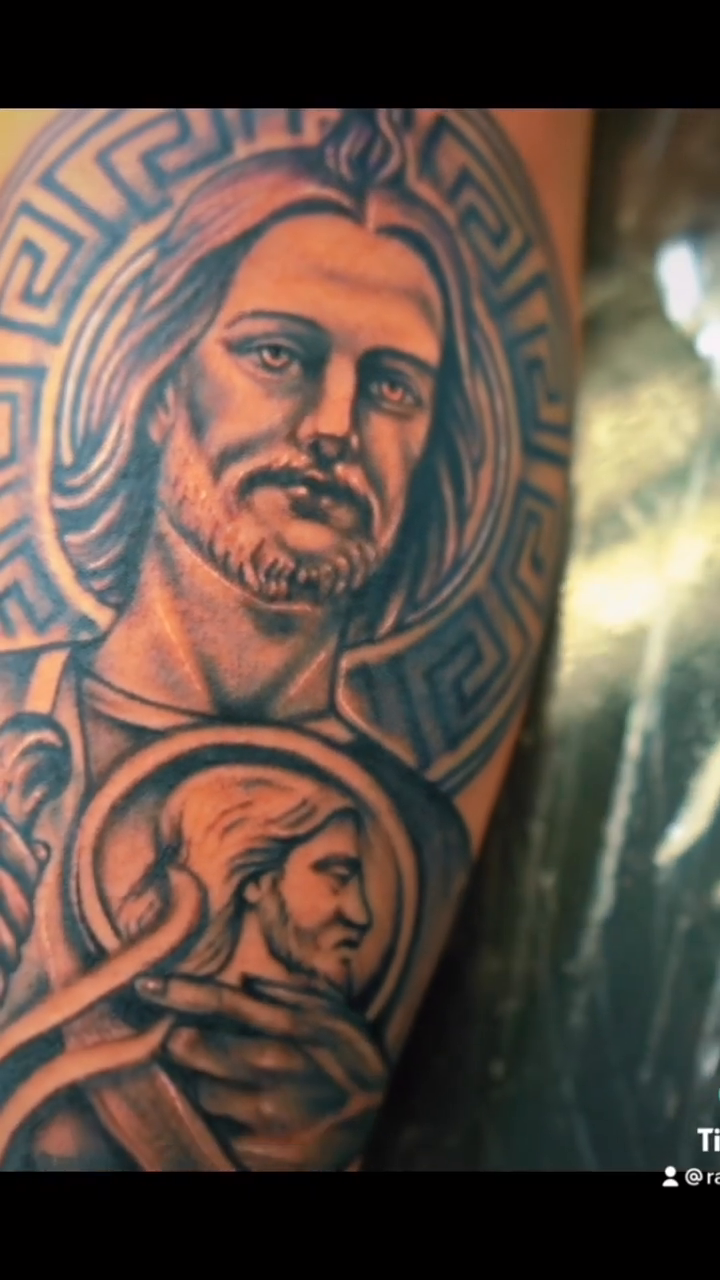 Jesus Christ portrait with religious iconography realism tattoo by Summer Rain