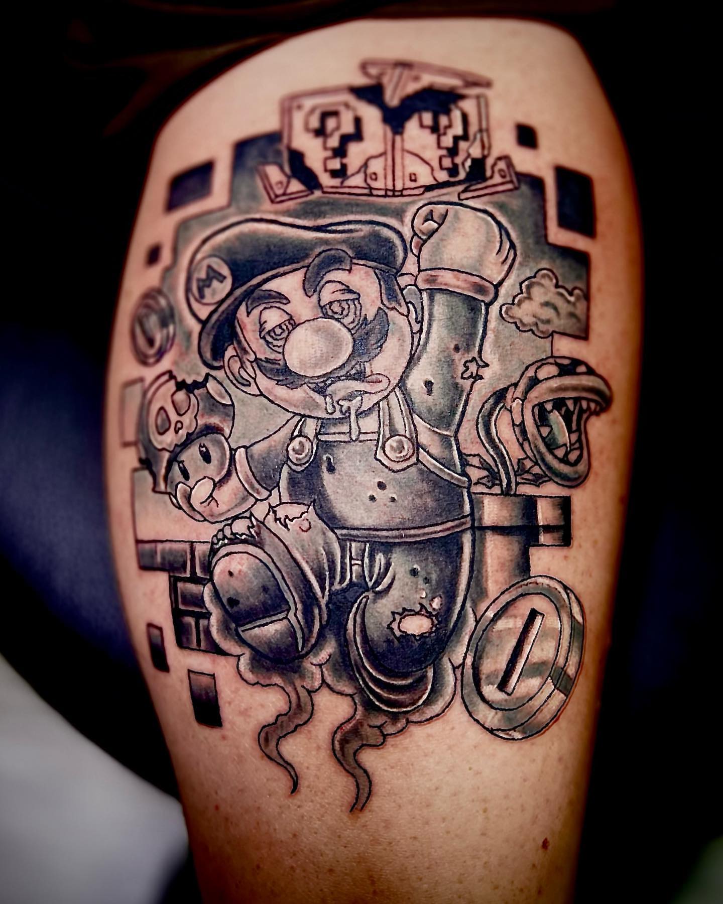 Mario black and grey tattoo on the forearm by Luis Cabrera, Cleveland, Ohio