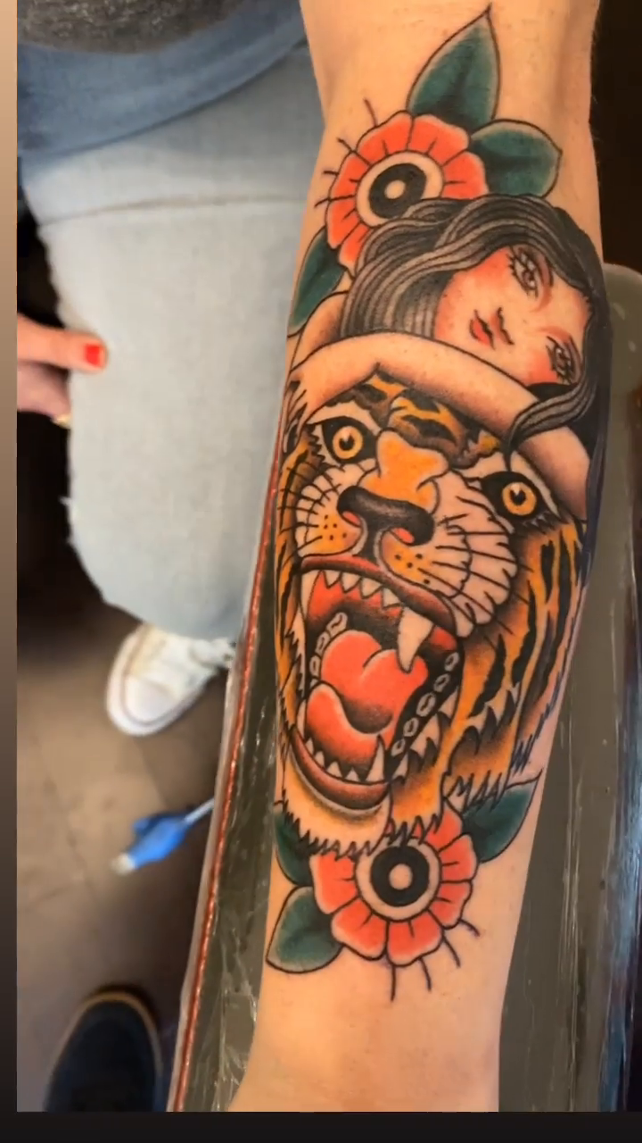 Tiger head with woman American traditional tattoo by Justin Hendrick