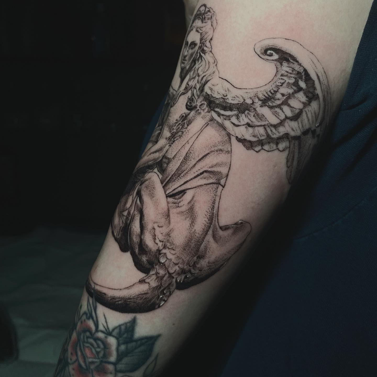 Angel with skull realism tattoo on the forearm by Sydney Dixon, Sacramento, California