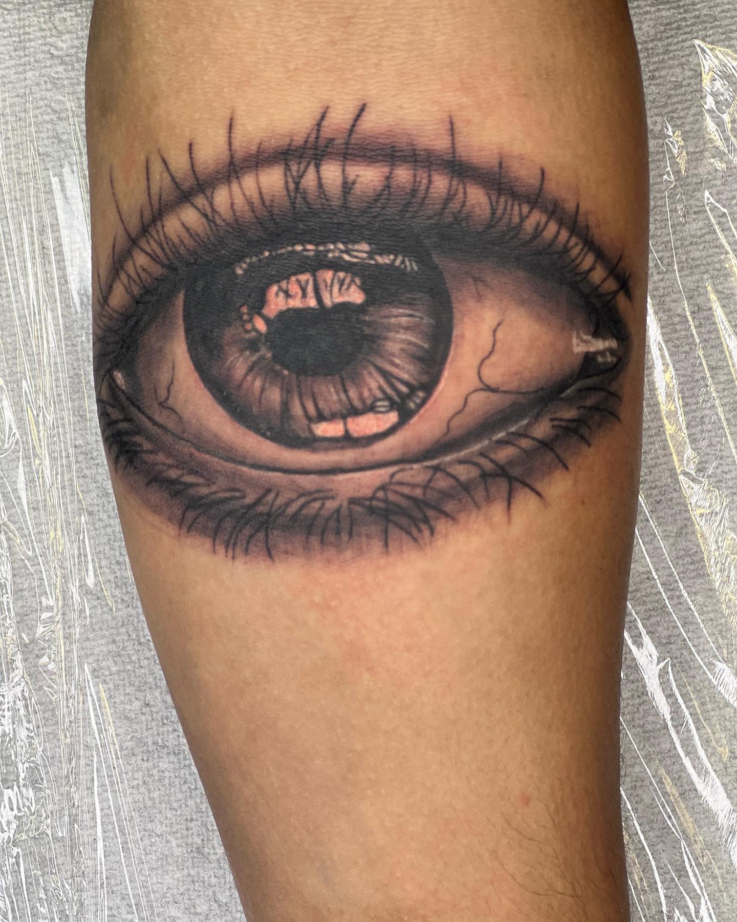 Eye realism tattoo on the forearm by Glen Wallis