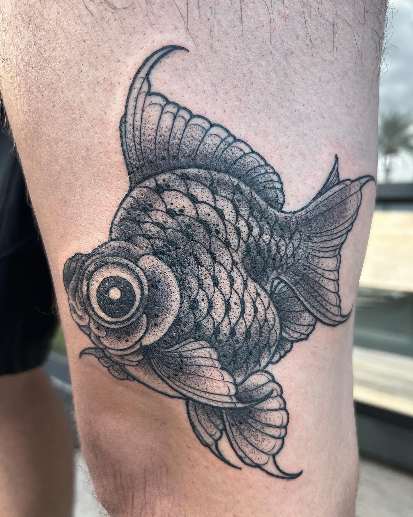 Goldfish dotwork tattoo on the thigh by Byron Winkelman, Gilbert, Arizona