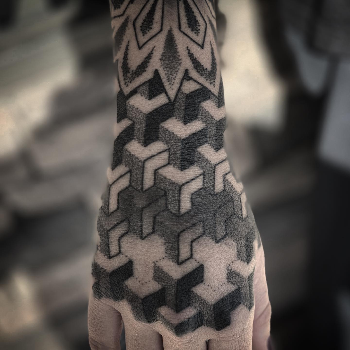 Geometric pattern dotwork tattoo on the hand by Donovan hernandez