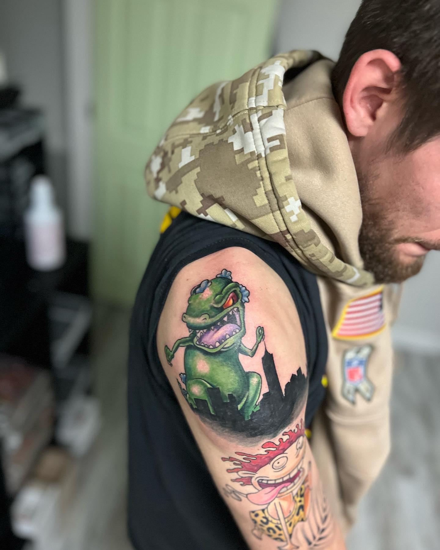 Reptar new school tattoo on the shoulder by Luis Cabrera, Cleveland, Ohio