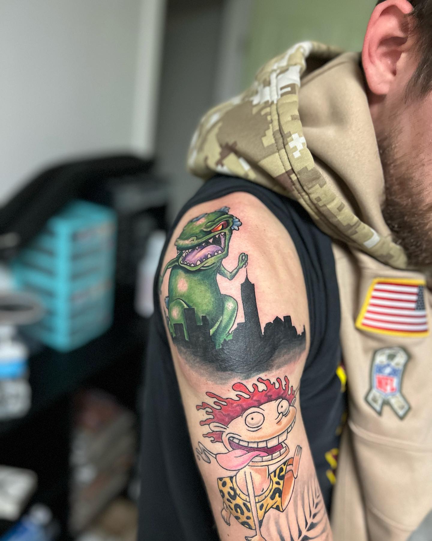 Russell and alien realism tattoo on the shoulder by Luis Cabrera, Cleveland, Ohio