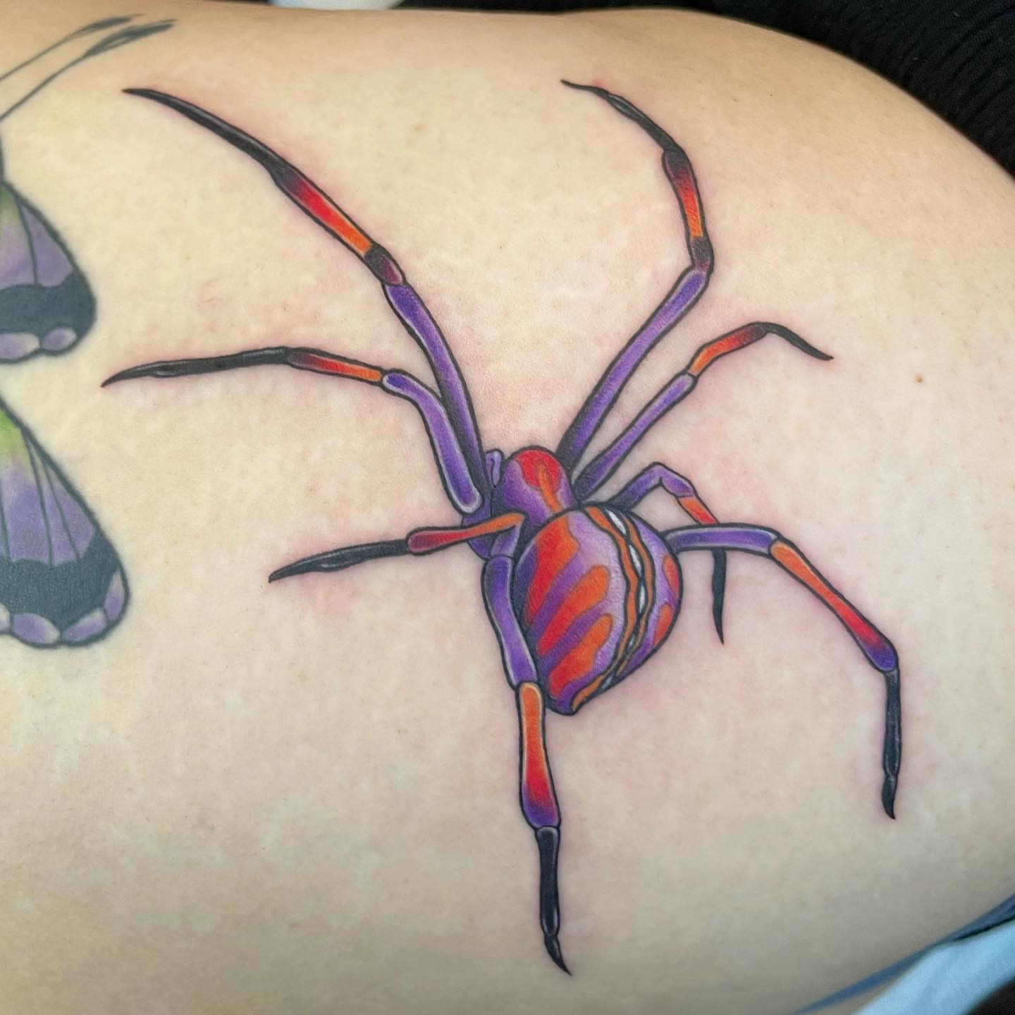 Spider new school tattoo on the thigh by Chelsea Youngblood, Seattle, Washington