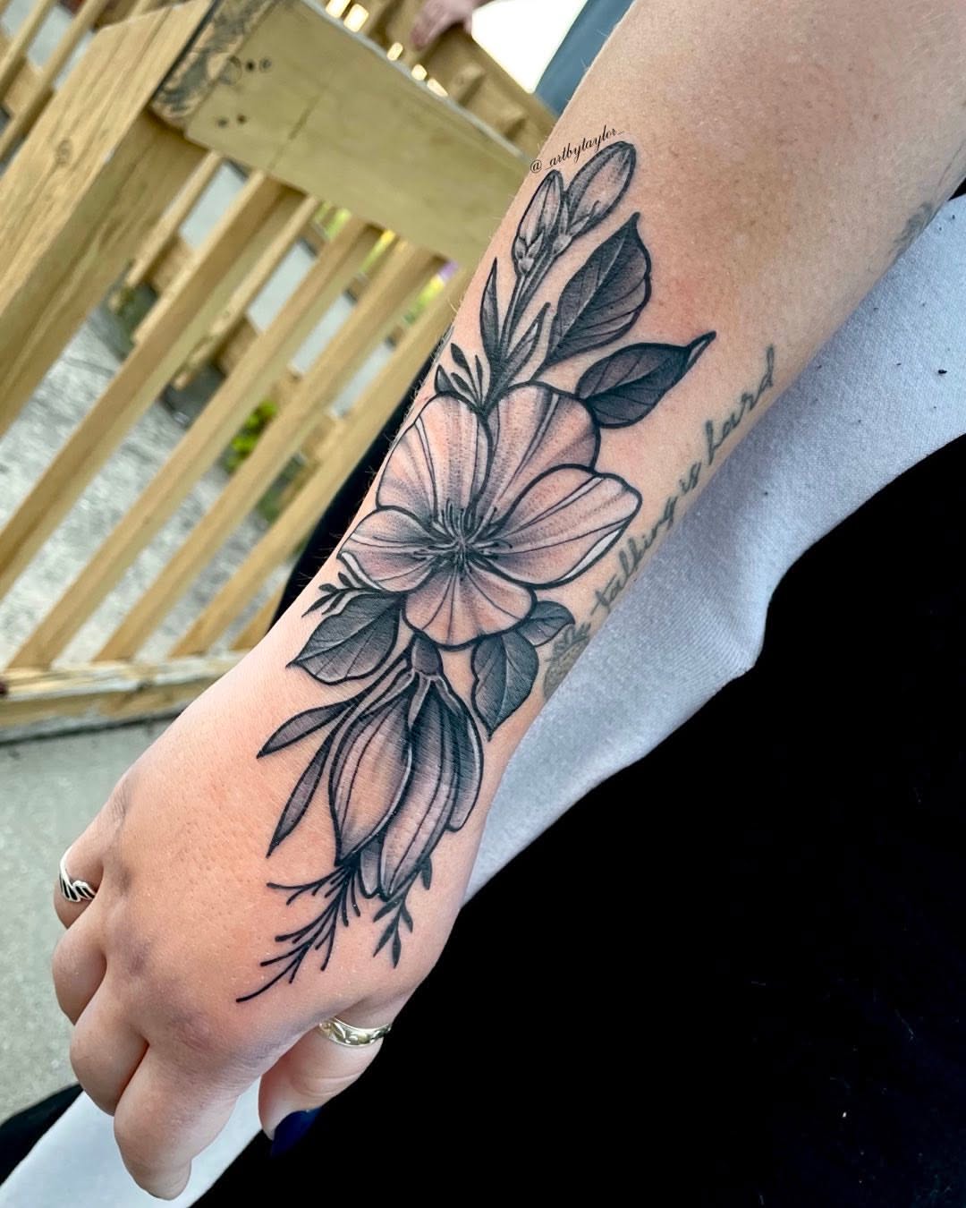 Flower black and grey tattoo on the forearm by Taylor✍🏽️