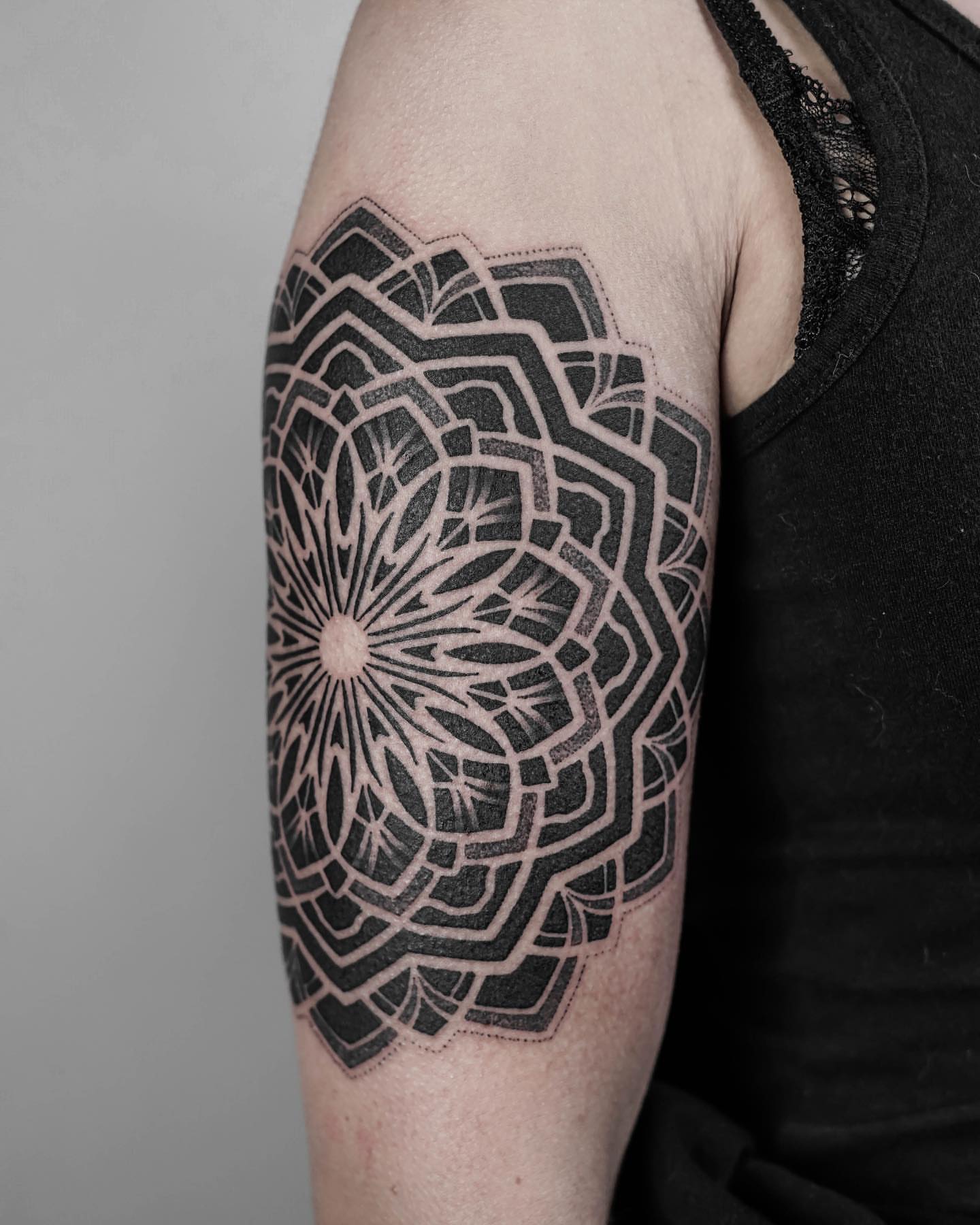 Geometric mandala geometric tattoo on the forearm by Ross Krandel
