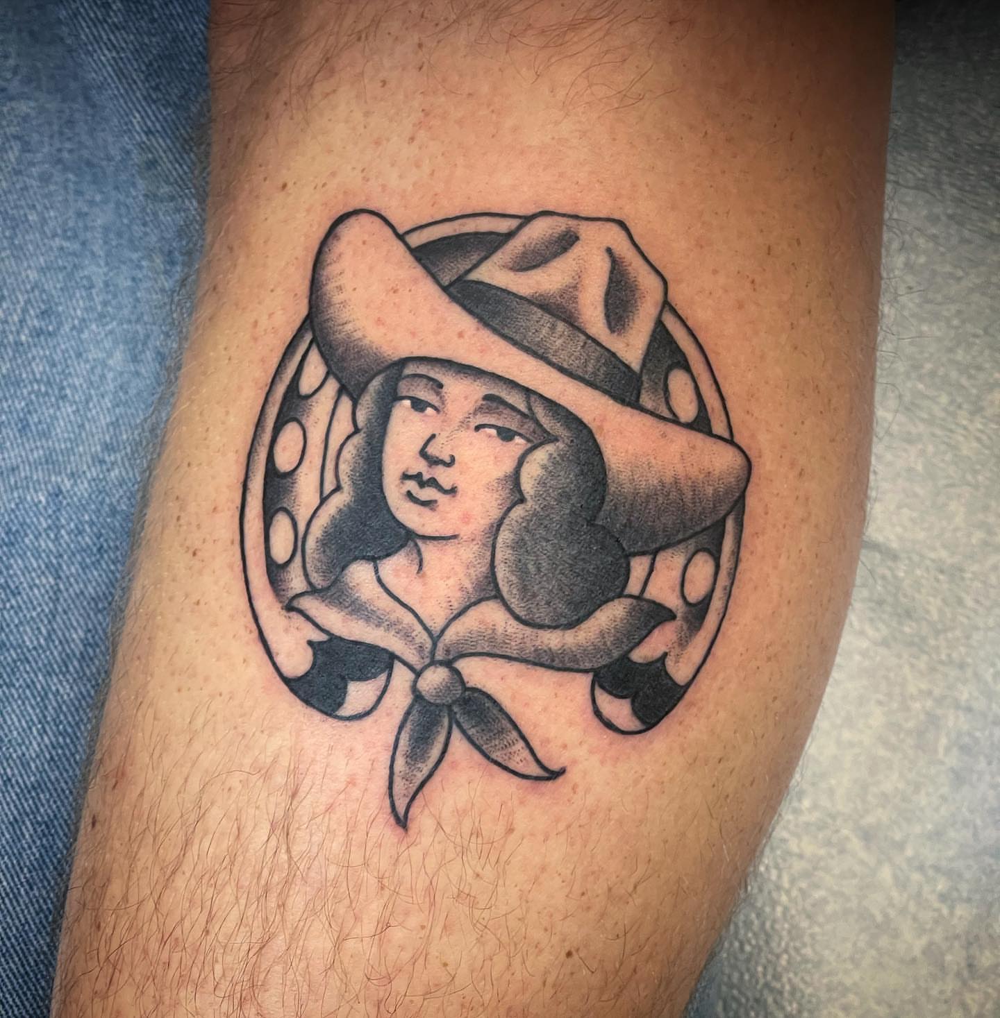Cowboy American traditional tattoo on the forearm by Dave Shurman
