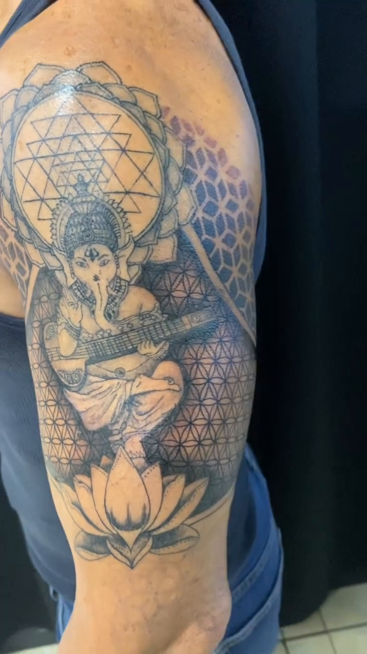 Ganesha with geometric patterns geometric tattoo by Nicholas Jones