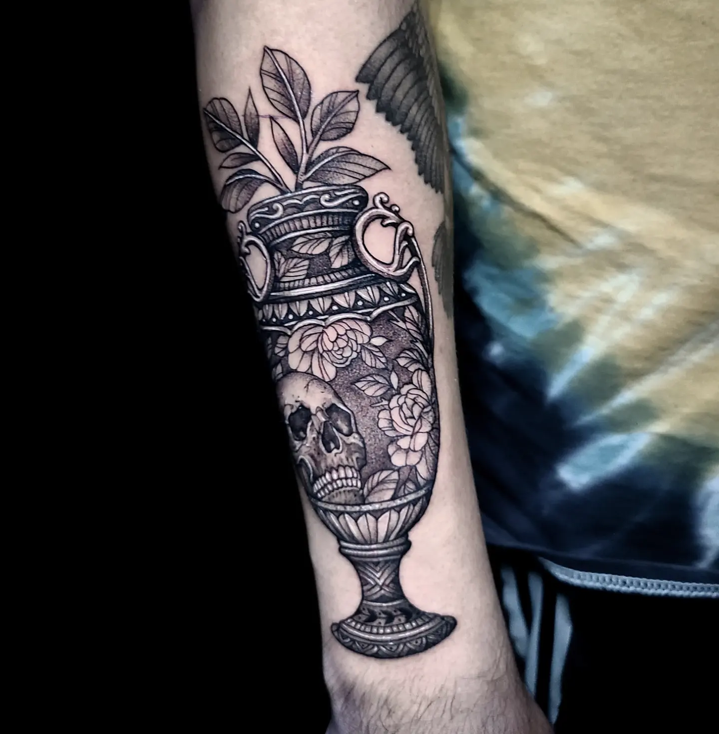Vase with skull and flowers realism tattoo on the forearm by Sydney Paige, Mentor, Ohio
