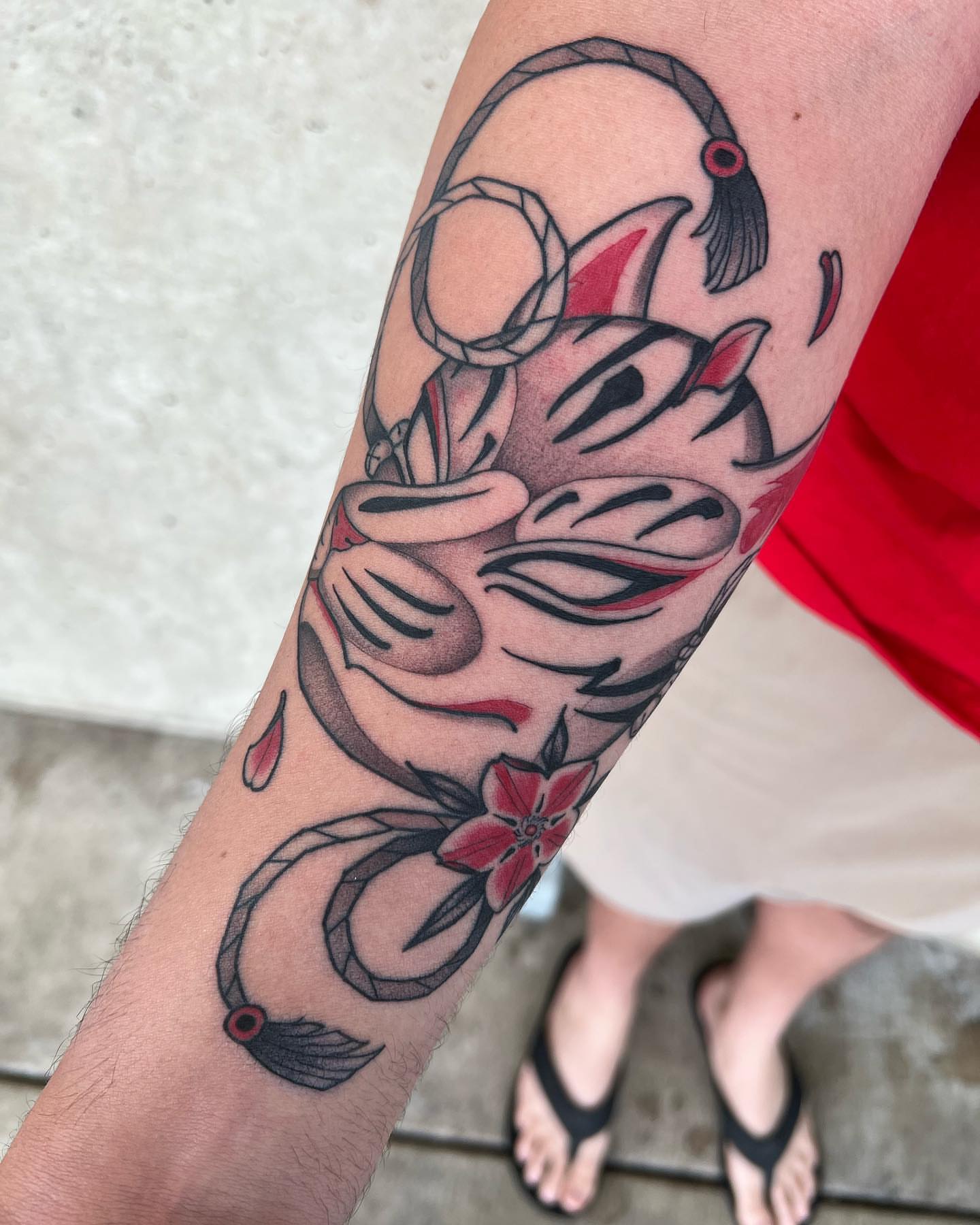 Cat and rope American traditional tattoo on the forearm by Neo-Traditional tattoos in Las Vegas