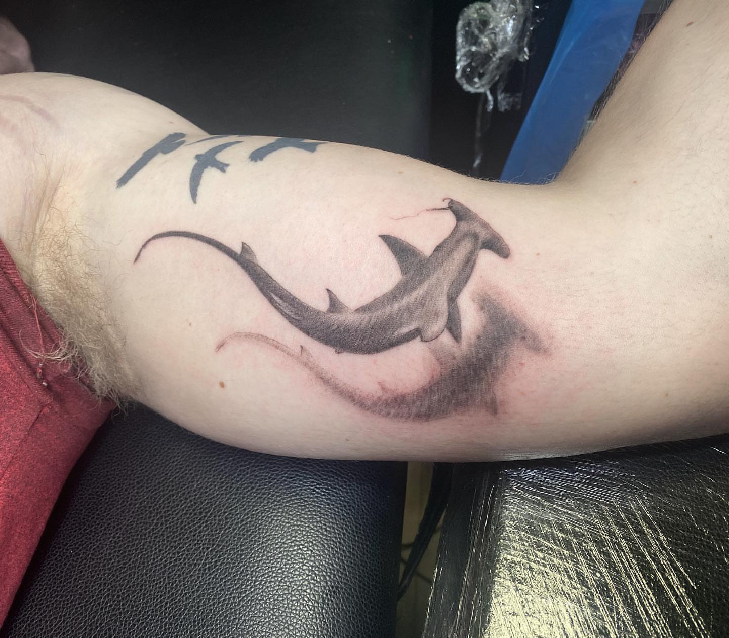 Hammerhead shark black and grey tattoo on the forearm by Tattoosxjoseph