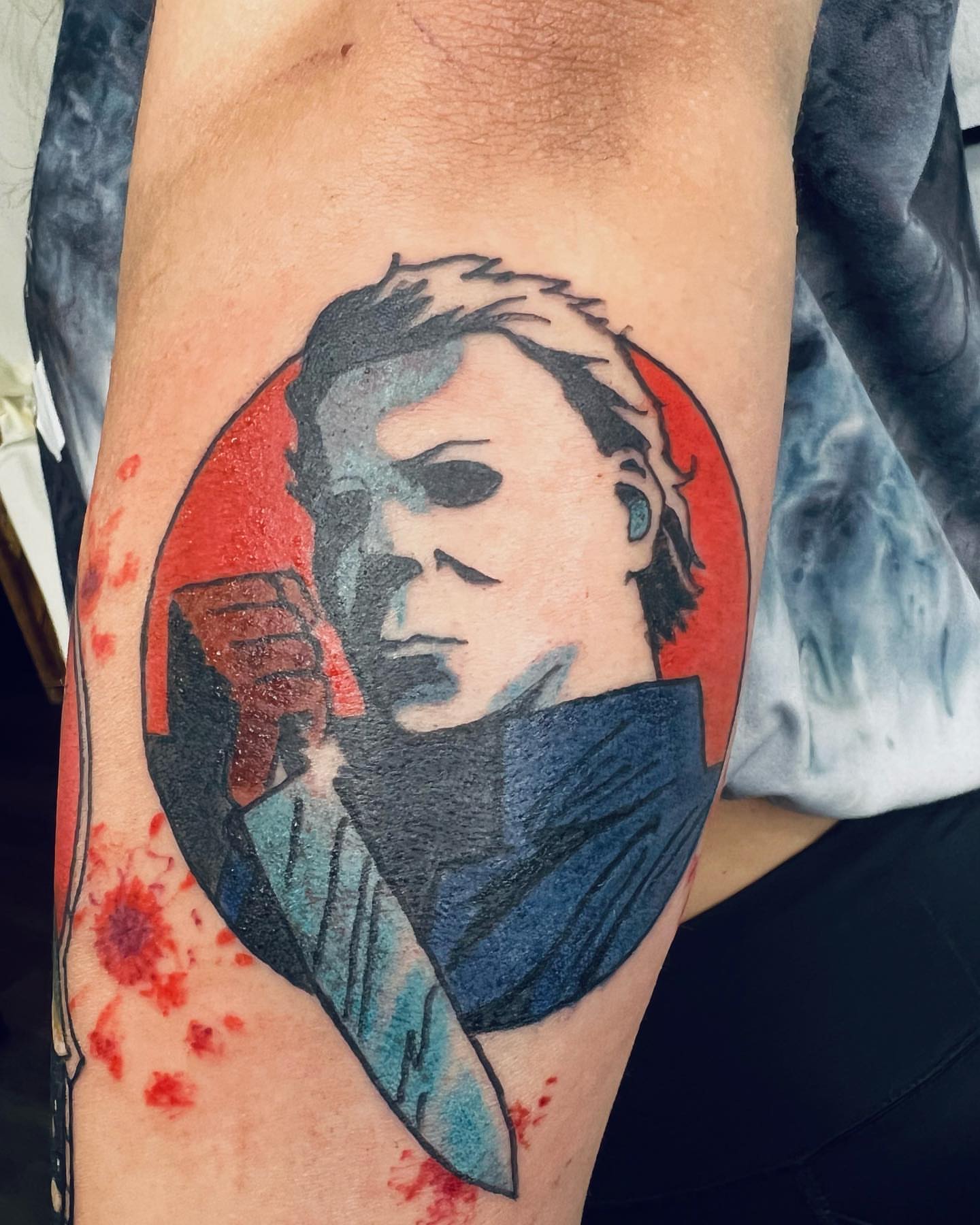 Michael Myers American traditional tattoo on the forearm by Henry Fuentes