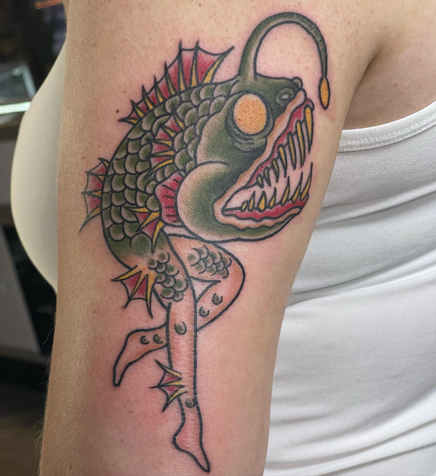 Fish American traditional tattoo on the forearm by Zach Eden