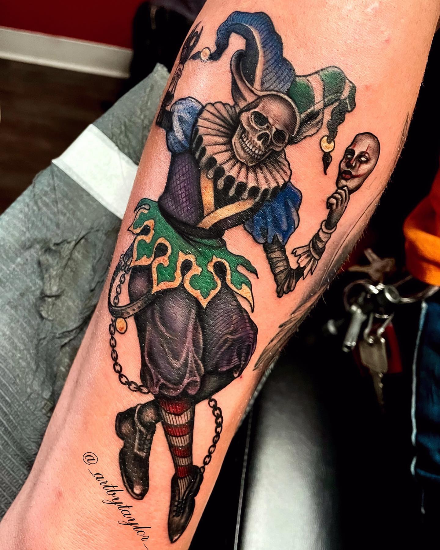 Jester skull American traditional tattoo on the forearm by Taylor✍🏽️