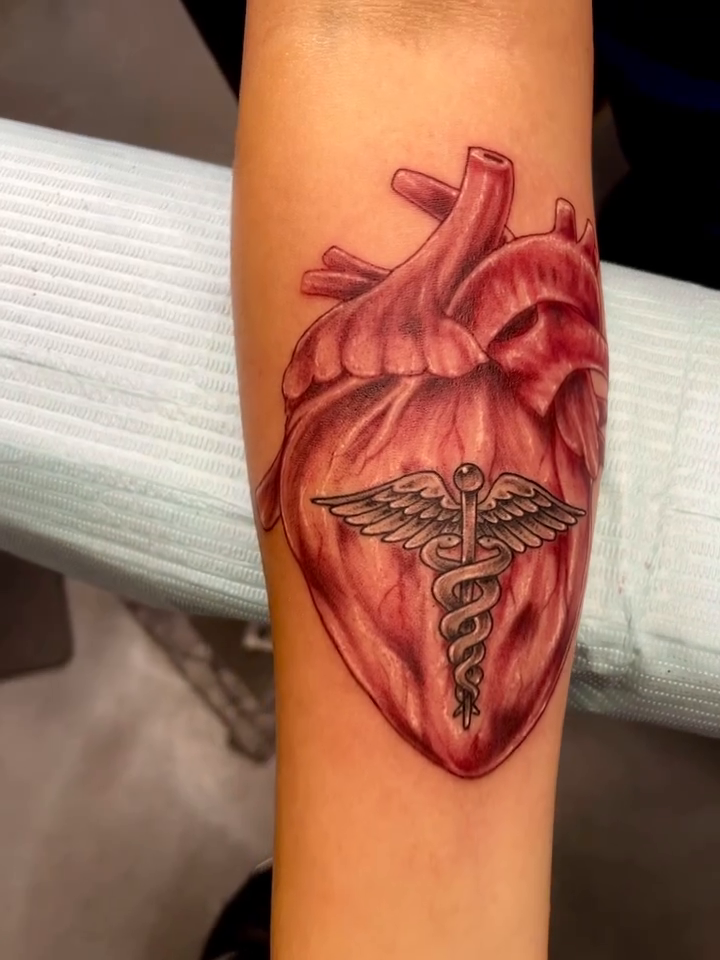 Anatomical heart with caduceus realism tattoo by ♠️KEITHKUSTOM♠️ San Antonio Tattoo Artist
