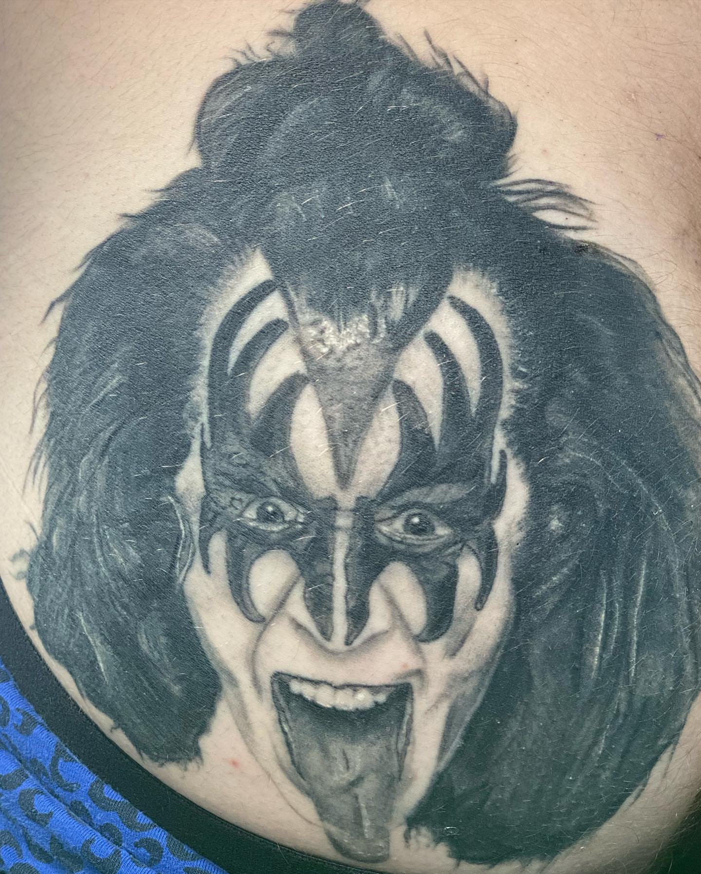 KISS band member black and grey tattoo on the torso by Alberto Ramirez