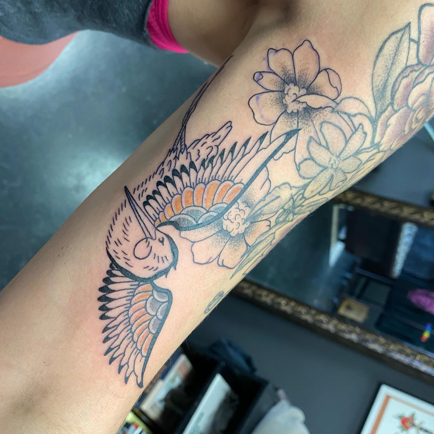 Hummingbird and flowers American traditional tattoo on the forearm by S C O T T