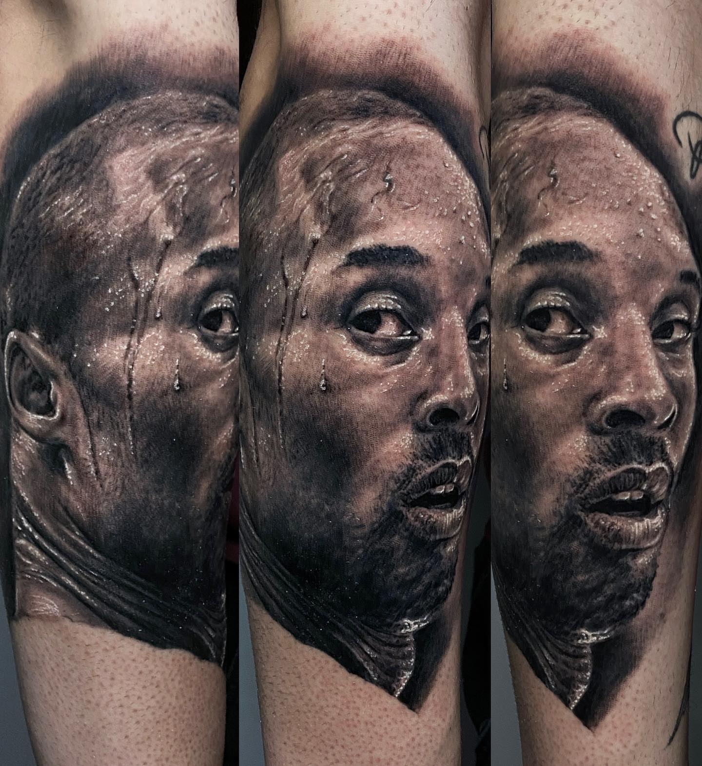 Man's face realism tattoo on the forearm by Rusty Dornhecker, Columbus, Ohio