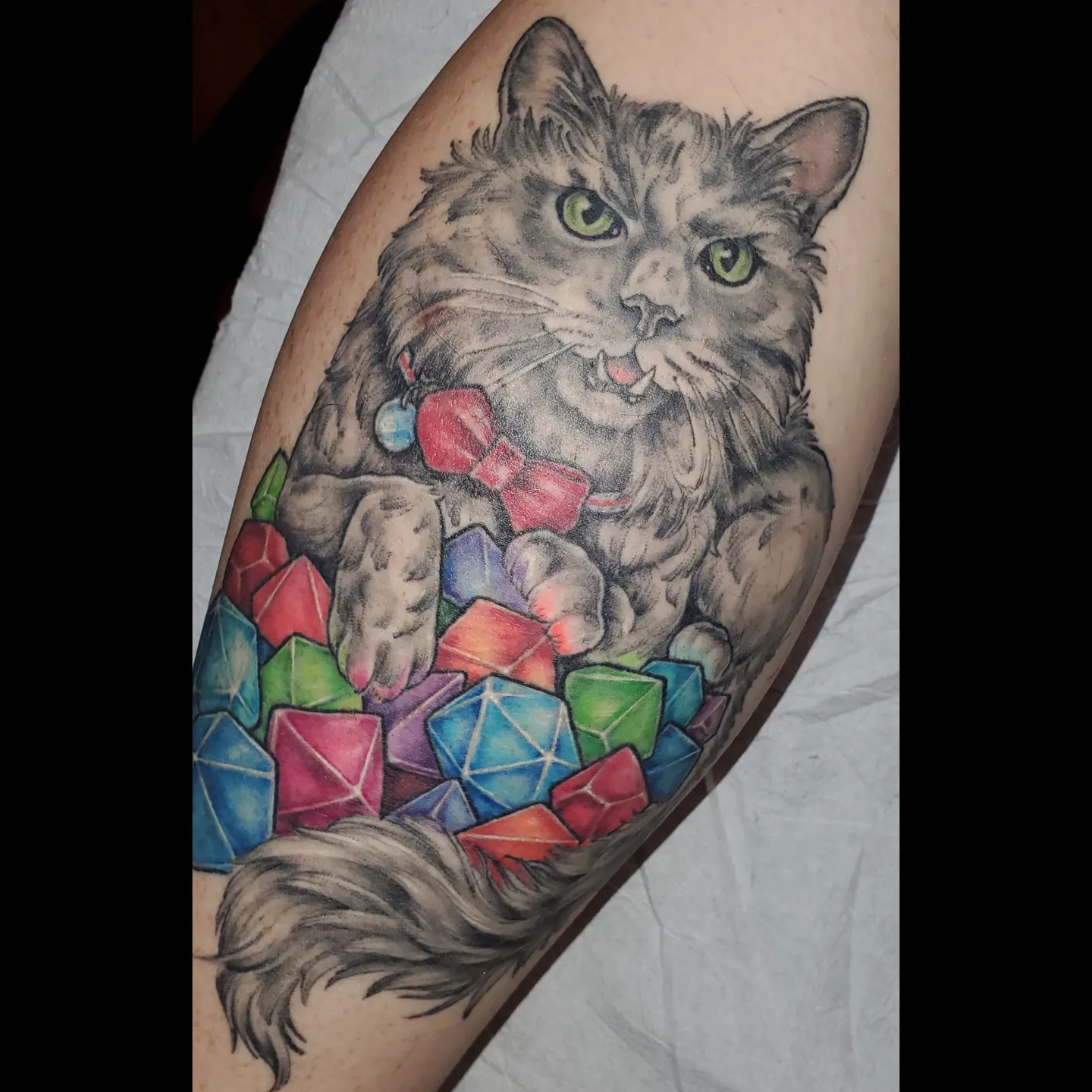 Tattoo by @erinrietzetattoo — realism, dotwork