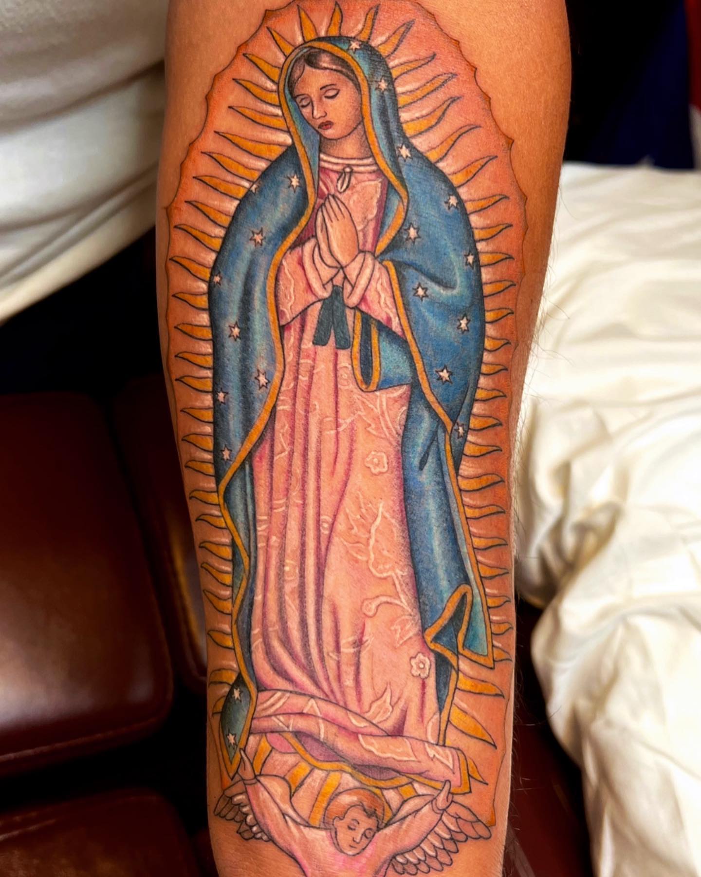 Our Lady of Guadalupe American traditional tattoo on the forearm by Artfabn