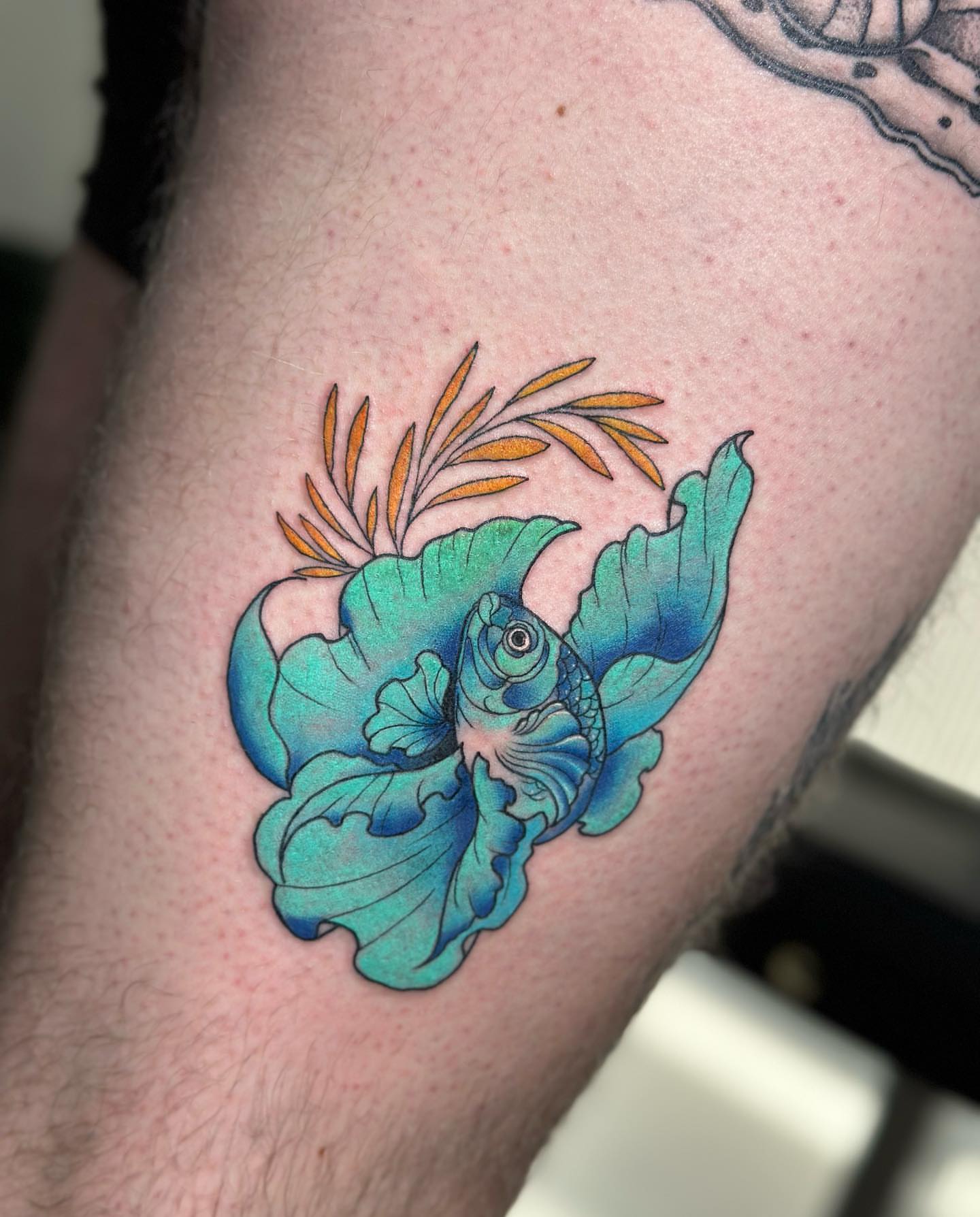 Fish and flower new school tattoo on the thigh by alex h🪴 neotrad