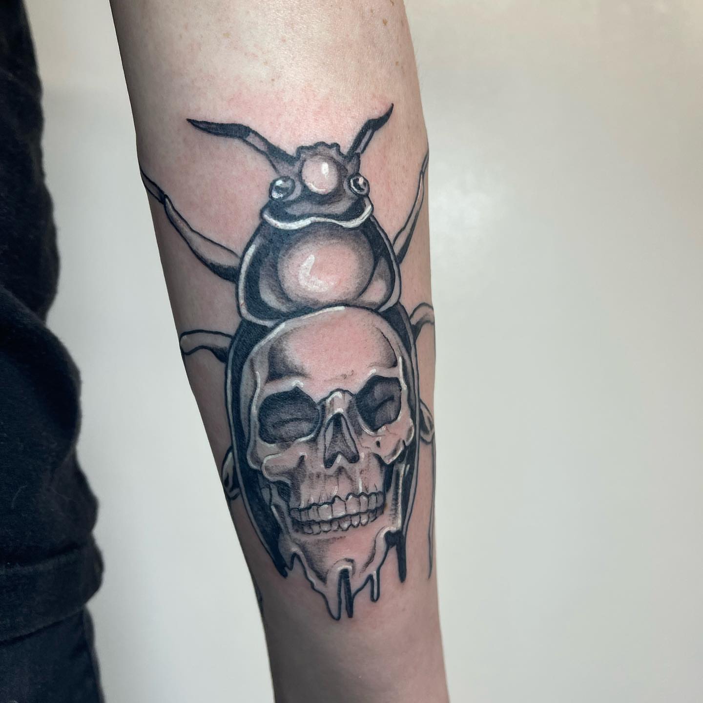 Skull beetle realism tattoo on the forearm by Sarah Bobby, Houston, Texas