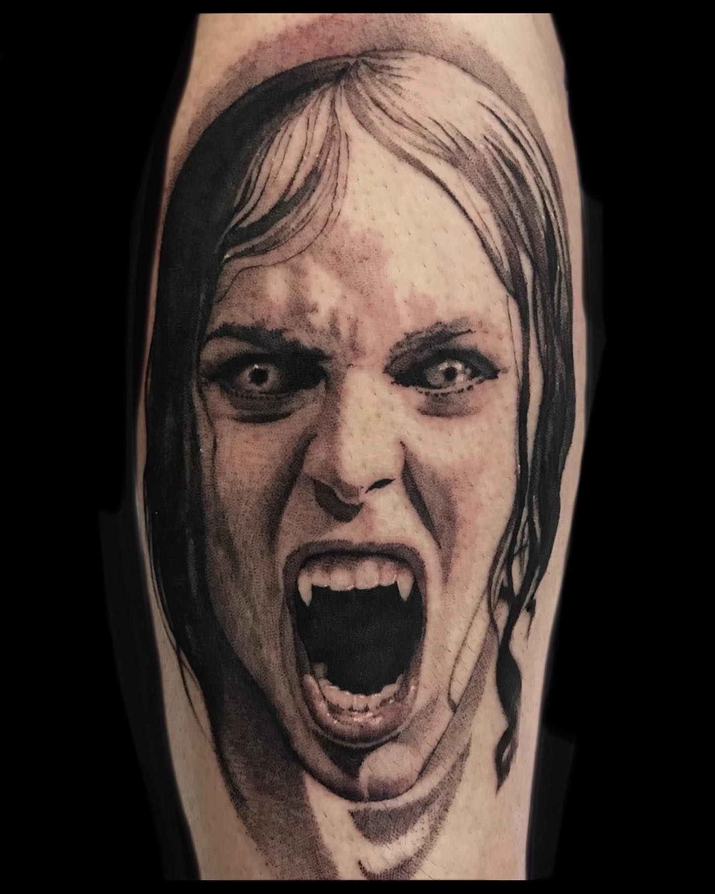 Angry woman realism tattoo on the forearm by Justin Hendrick