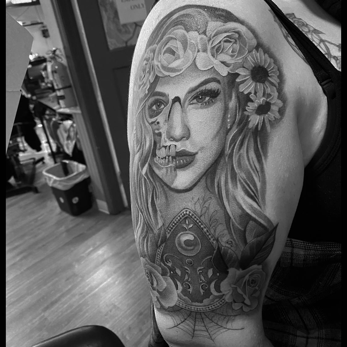 Tattoo by @acruz_707 — black_and_grey, realism