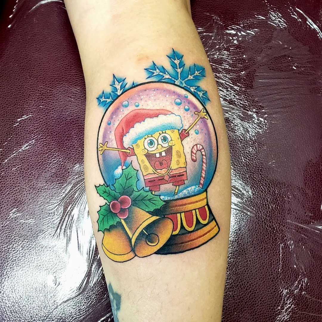 Spongebob snow globe new school tattoo on the forearm by Jake Lee