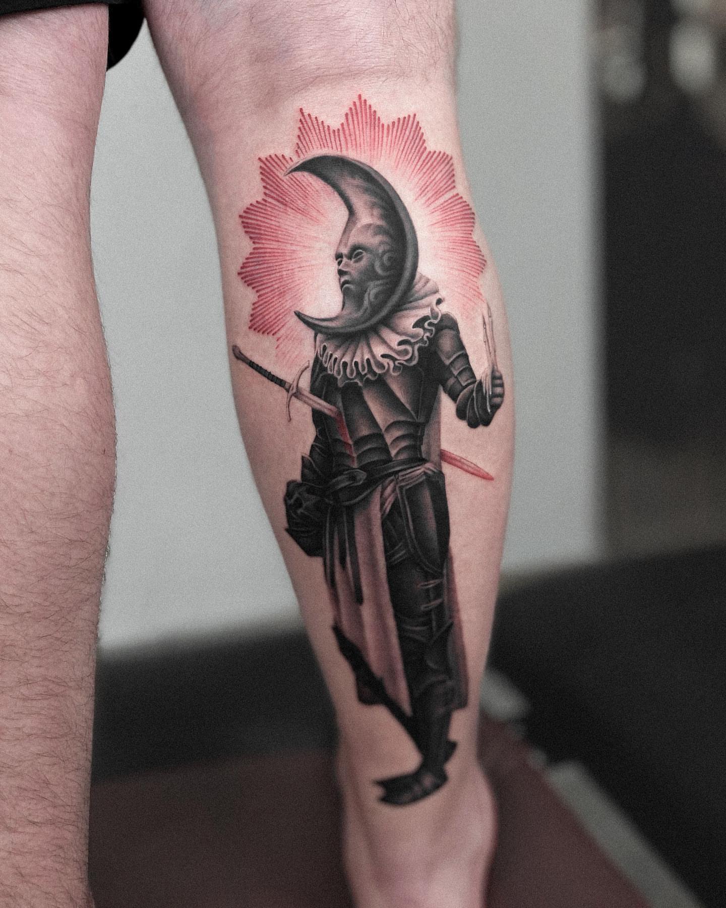 Jester American traditional tattoo on the calf by Oleksandr Moroz