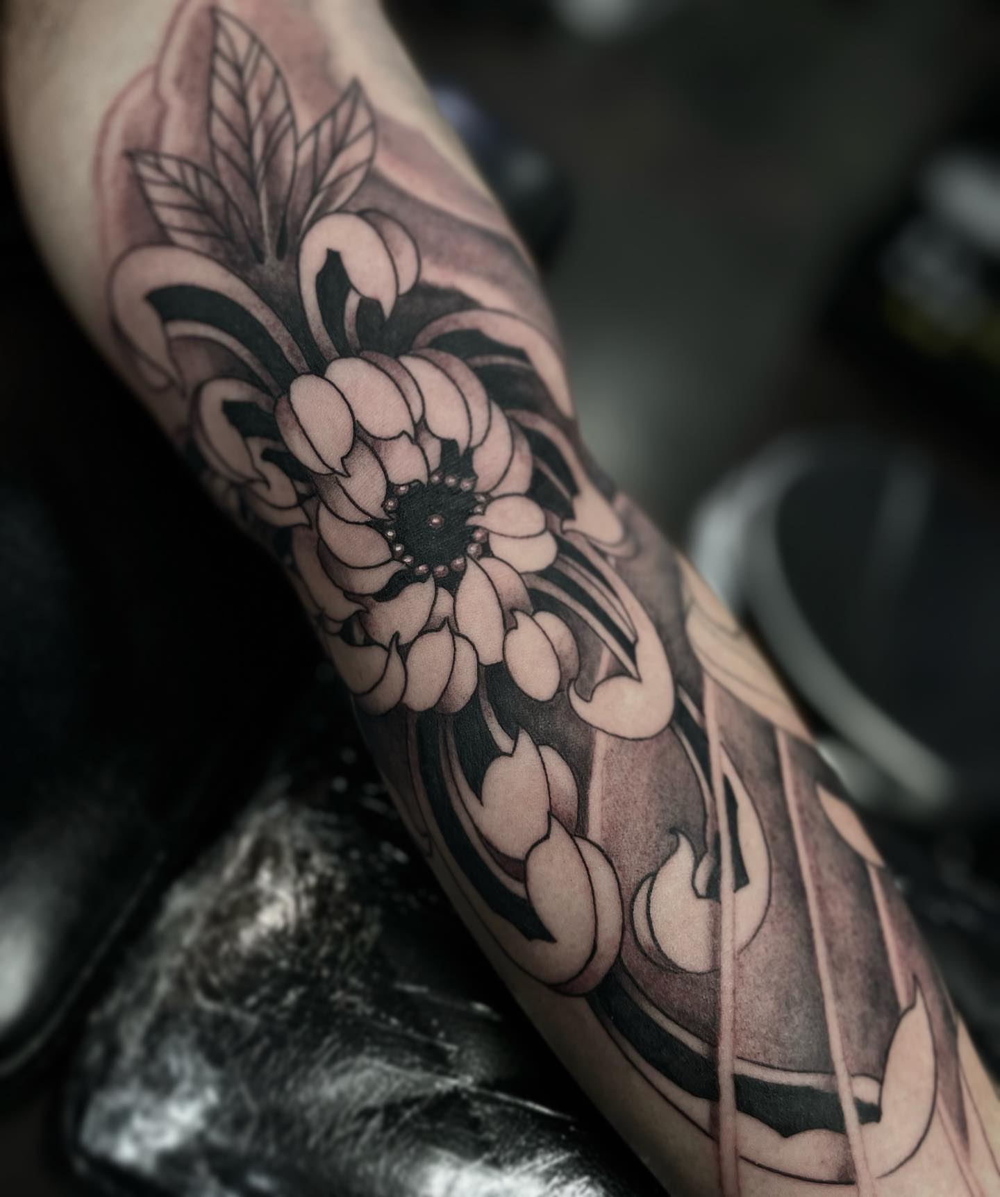 Cherry blossoms American traditional tattoo on the forearm by Tam Nguyen