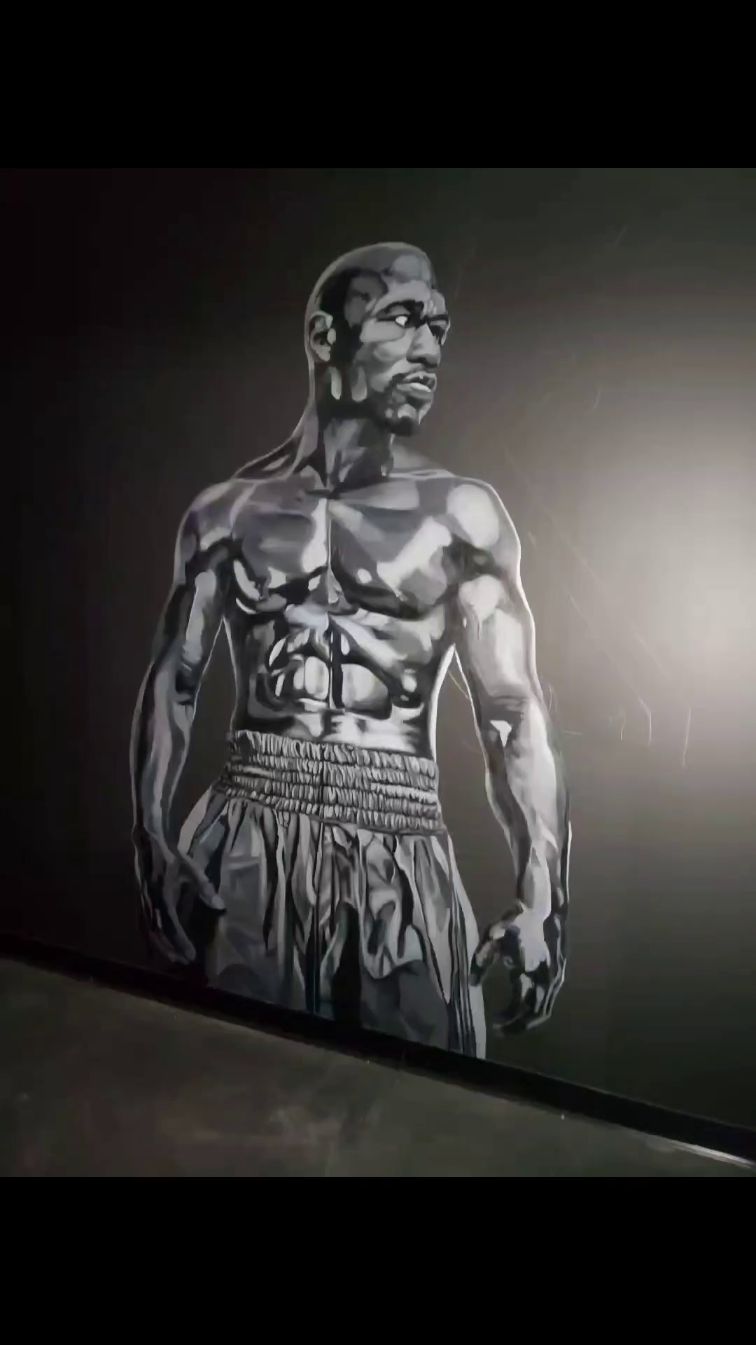 Muscular man realism tattoo by Dannie Blythewood